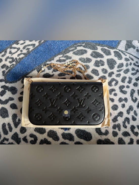 Source Unknown Handbags - Louis. Vuitton. Black Embossed Crossbody Purse with Gold Chain